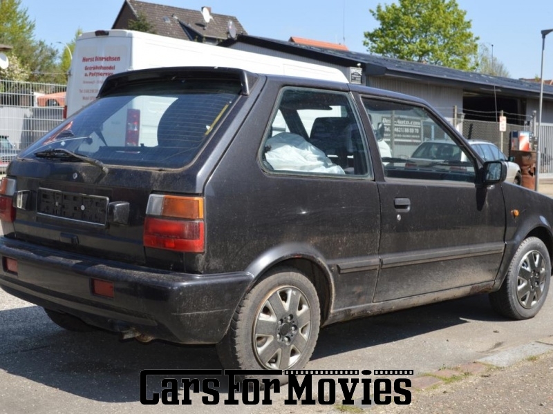 CarsForMovies | Nissan Micra K10 Super S 1990 Japan Schwarz Sonstige Zivilfahrzeug Kleinwagen Schleswig-Holstein 3369 