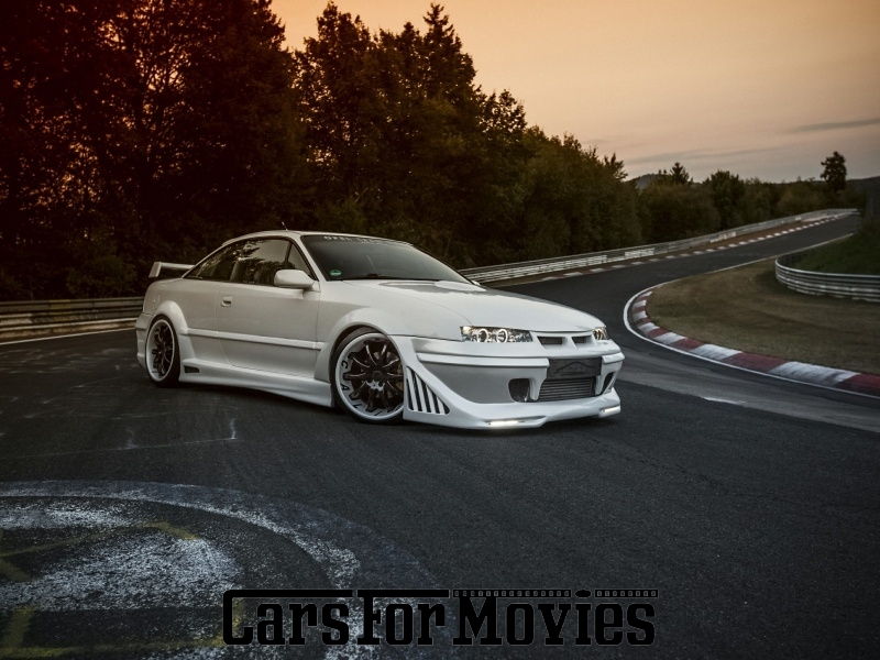 CarsForMovies | Opel Calibra 1996 Deutschland Weiß Schwarz Zivilfahrzeug Coupe Baden-Württemberg 4731 Custom Tuning Roadshow Event Unikat