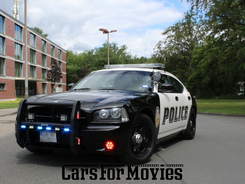 CarsForMovies | Dodge Charger Police Interceptor 2009 USA Schwarz Schwarz Einsatzfahrzeug Polizeifahrzeug West Nordrhein-Westfalen 5060 Policecar Departments Jamaica Beach Texas US-Police Original Blaulicht Sirene Rammbock