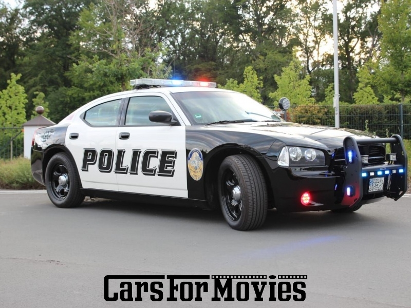 CarsForMovies | Dodge Charger Police Interceptor 2009 USA Schwarz Schwarz Einsatzfahrzeug Polizeifahrzeug West Nordrhein-Westfalen 5060 Policecar Departments Jamaica Beach Texas US-Police Original Blaulicht Sirene Rammbock