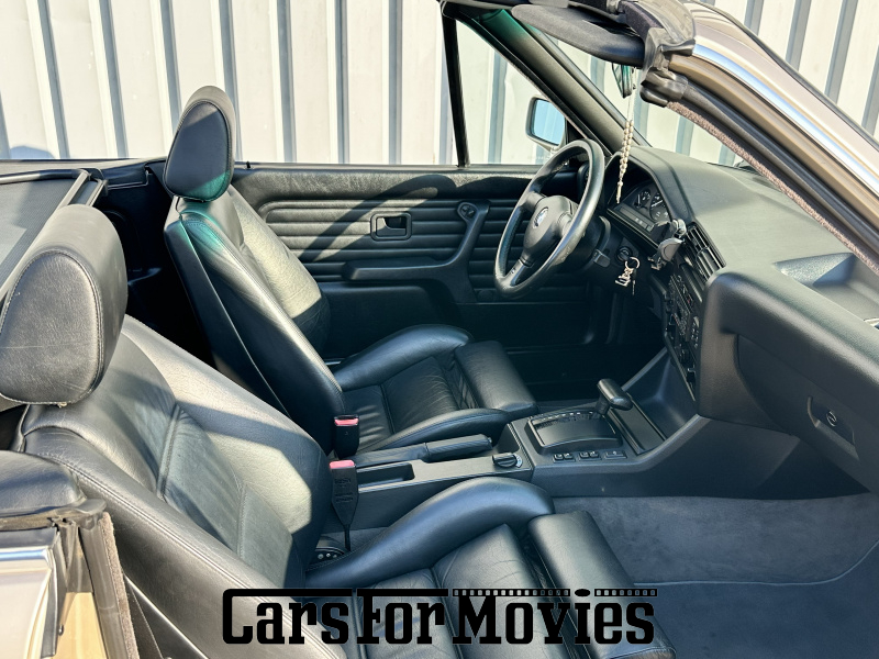 CarsForMovies | BMW 325i Cabrio 1992 Deutschland Beige Schwarz Zivilfahrzeug Cabrio DE - Bayern 7750 Cabrio
BMW E30